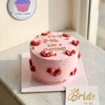 Pink cake with red hearts shining like diamond