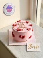 Pink cake with red hearts shining like diamond