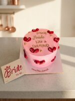 Pink cake with red hearts shining like diamond